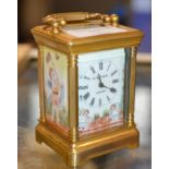 SMALL BRASS CASED CARRIAGE CLOCK BY ELLIOT & SON, LONDON, WITH KEY