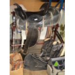 LEATHER SADDLE, PAIR OF COWBOY STYLE BOOTS, VARIOUS LEATHER BELTS ETC
