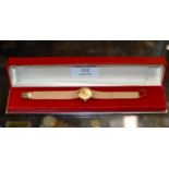 OMEGA LADIES 9 CARAT GOLD CASED WRIST WATCH ON ORIGINAL 9 CARAT GOLD BRACELET, WITH ORIGINAL BOX