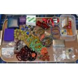 TRAY WITH ASSORTED COSTUME JEWELLERY, VARIOUS BEADS, AMBER STYLE BEADS, BANGLES, EARRINGS ETC