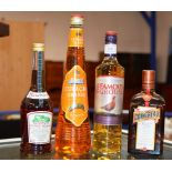 FOUR BOTTLE SPIRIT & LIQUEUR SELECTION COMPRISING FAMOUS GROUSE BLENDED SCOTCH WHISKY, COINTREAU,