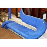 MODERN SHAPED SETTEE WITH MATCHING FOOT STOOL