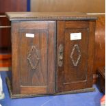 OAK DOUBLE DOOR SMOKERS CABINET WITH SMALL QUANTITY COINAGE