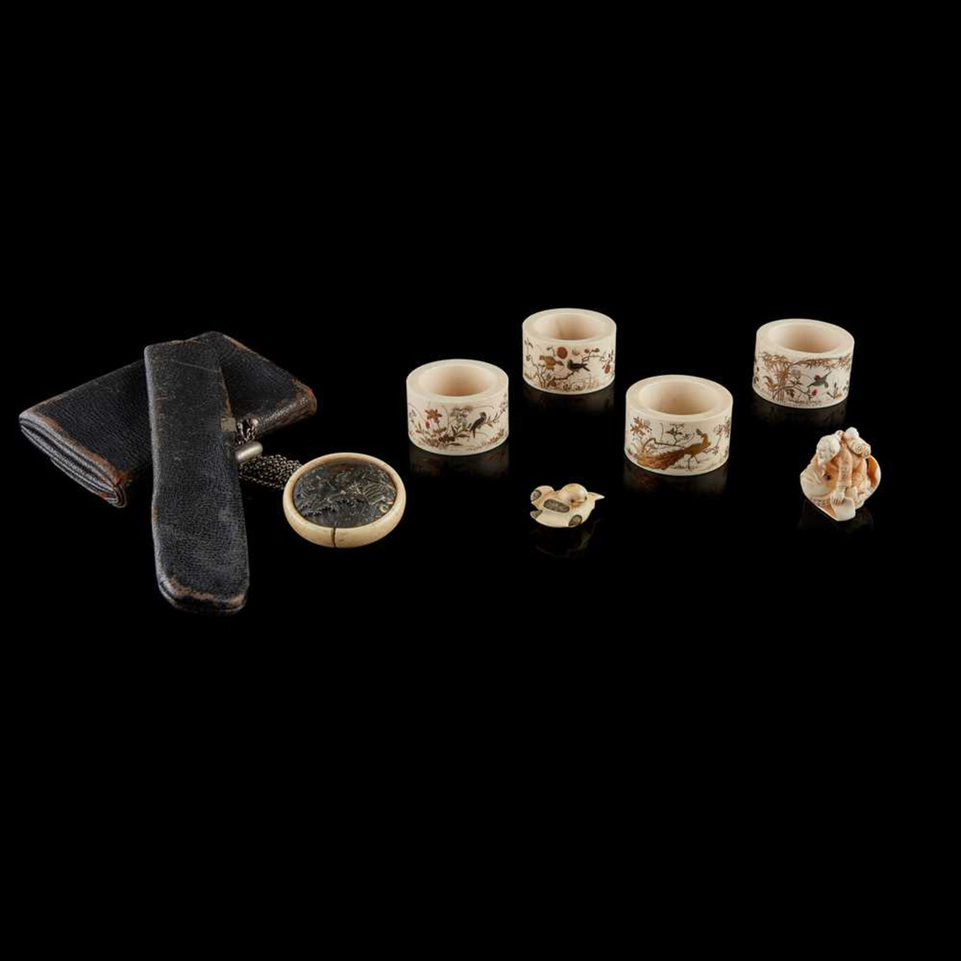 GROUP OF JAPANESE IVORIES AND A TOBACCO POUCH AND PIPE CASE