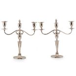 A pair of plated three-light candelabra