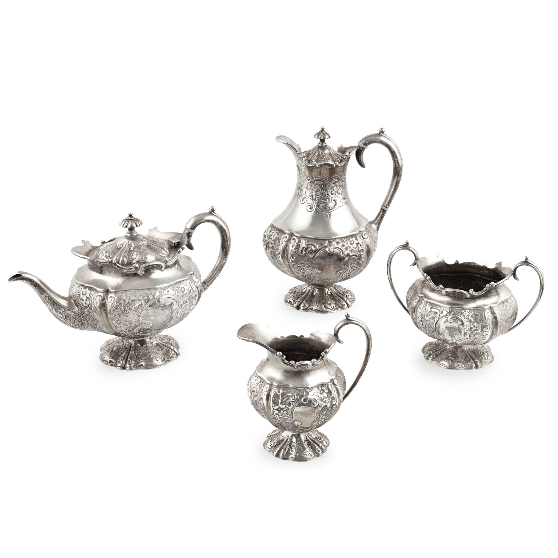 Y A late Victorian four-piece tea set