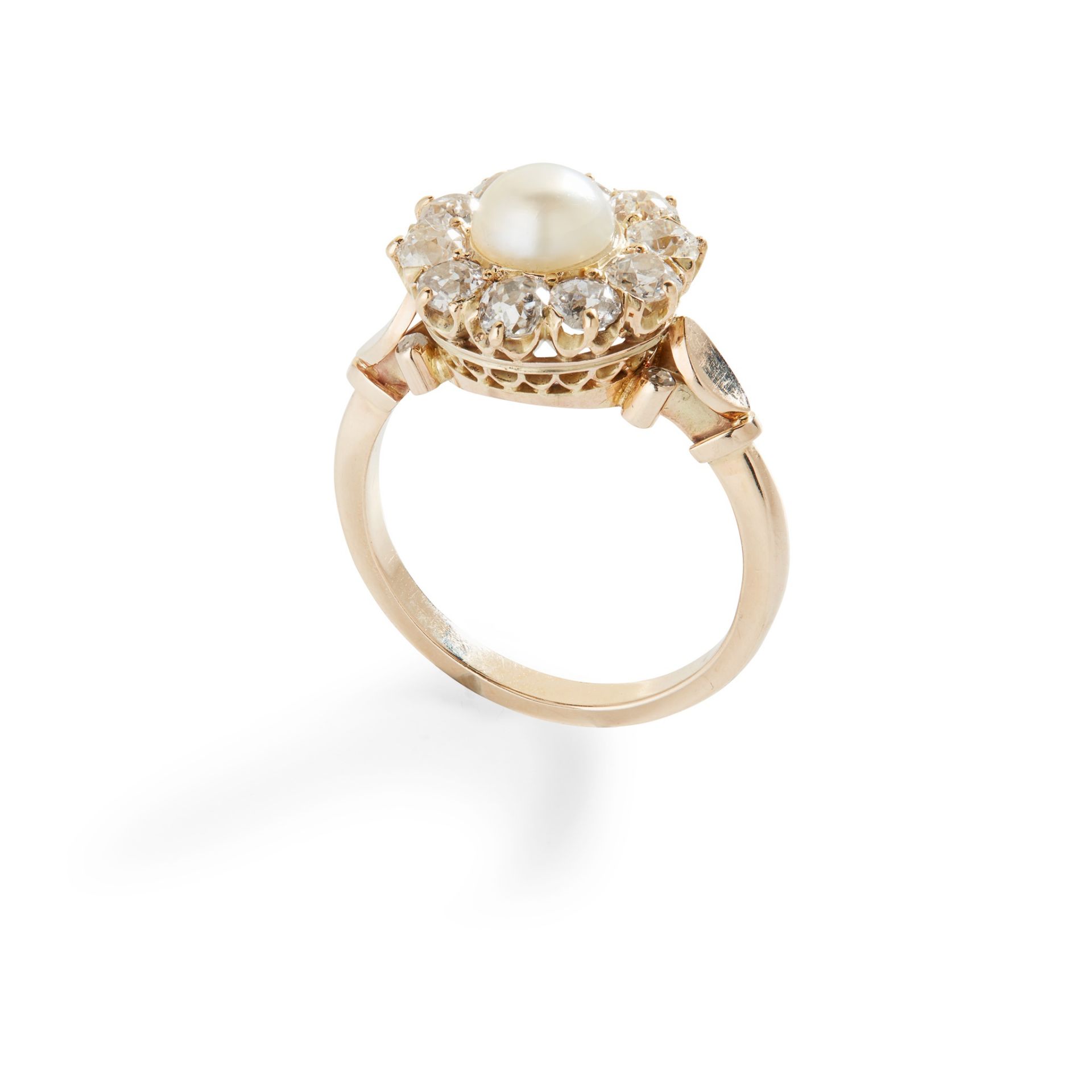 A pearl and diamond cluster ring