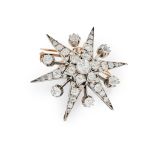 A diamond star brooch