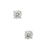 A pair of diamond stud earrings