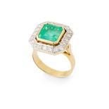 An emerald and diamond ring