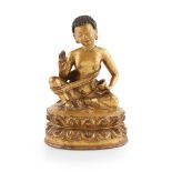 GILT BRONZE FIGURE OF MILAREPA QING DYNASTY, 19TH CENTURY