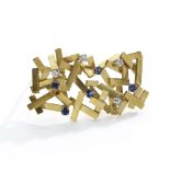§ A sapphire and diamond-set pendant/brooch, by Andrew Grima, 1979