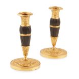 PAIR OF SMALL FRENCH GILT AND PATINATED BRONZE CANDLESTICKS CIRCA 1820