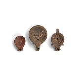 THREE ROMAN OIL LAMPS, CIRCA 300 AD, 19TH CENTURY PROVENANCE