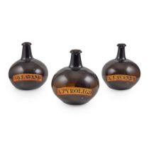 SET OF THREE LARGE AMBER GLASS APOTHECARY BOTTLES EARLY 19TH CENTURY