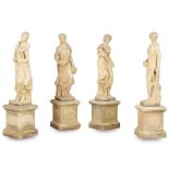 SET OF FOUR POURED STONE FIGURES OF THE SEASONS MODERN