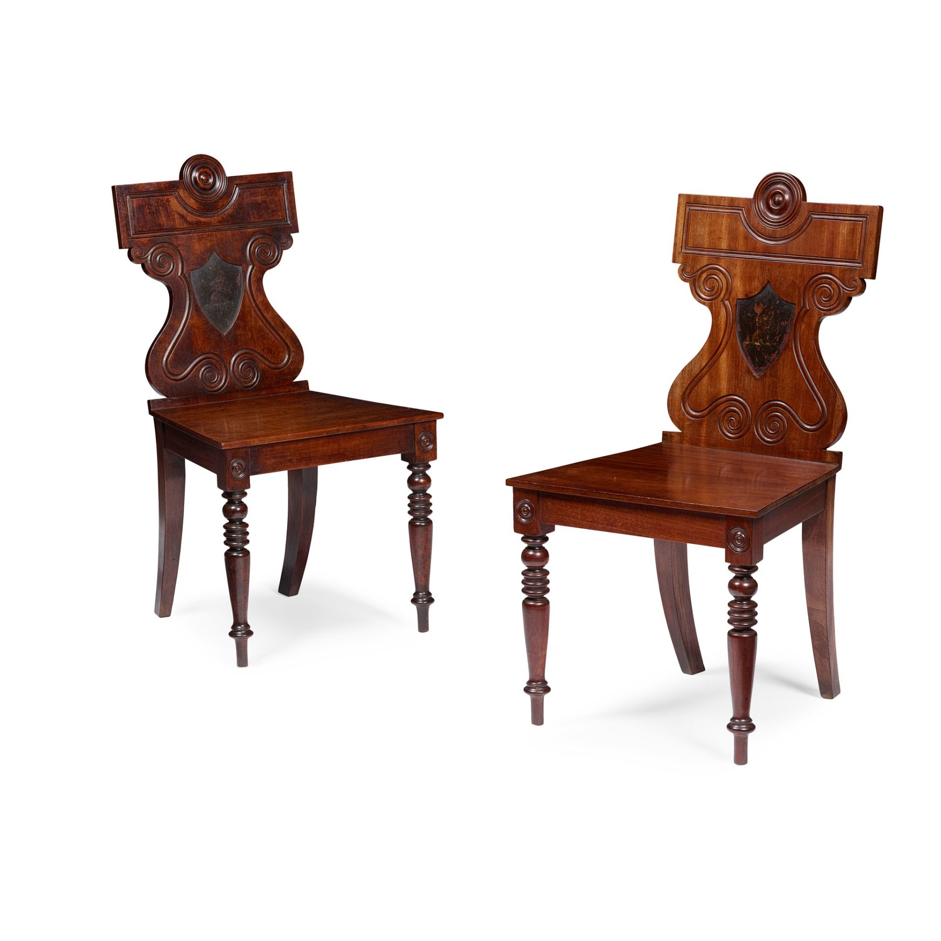 PAIR OF GEORGE III MAHOGANY CRESTED HALL CHAIRS 18TH CENTURY