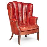 GEORGIAN STYLE CHANNEL BACK RED LEATHER WING ARMCHAIR EARLY 20TH CENTURY