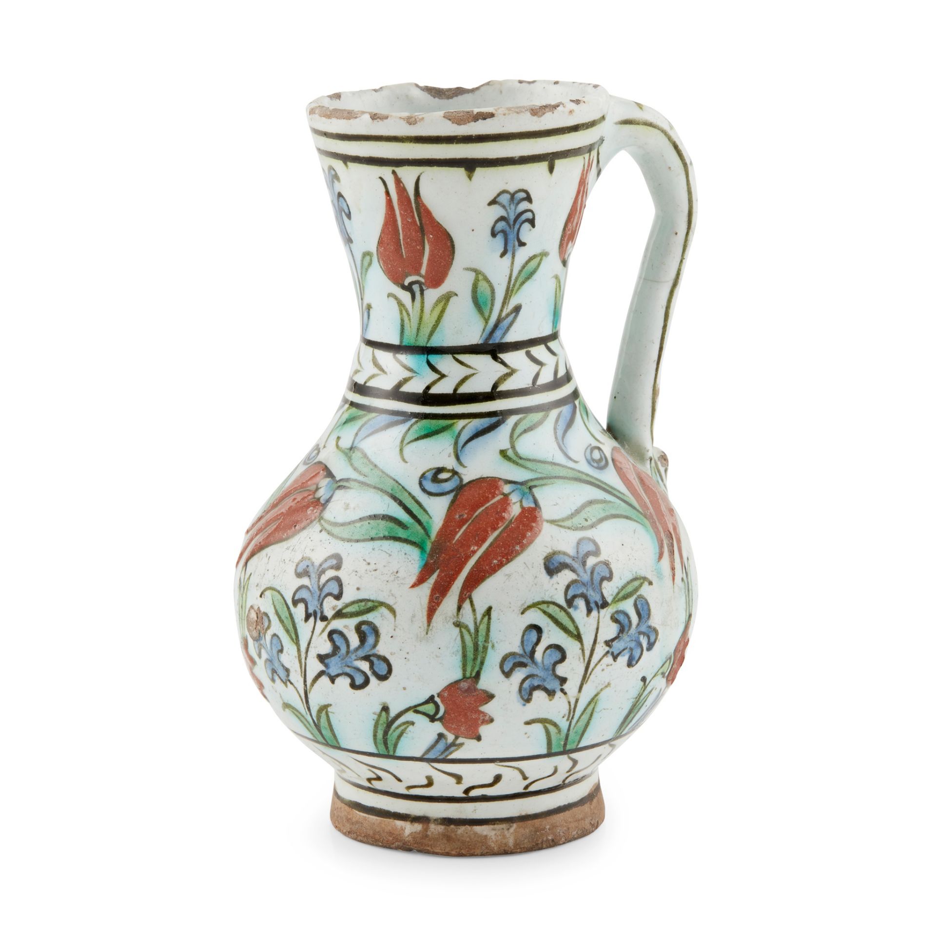 AN IZNIK POTTERY JUG WITH TULIPS AND HYACINTHS OTTOMAN TURKEY, EARLY 17TH CENTURY