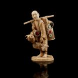 Y IVORY OKIMONO FIGURE OF A STREET VENDOR MEIJI PERIOD