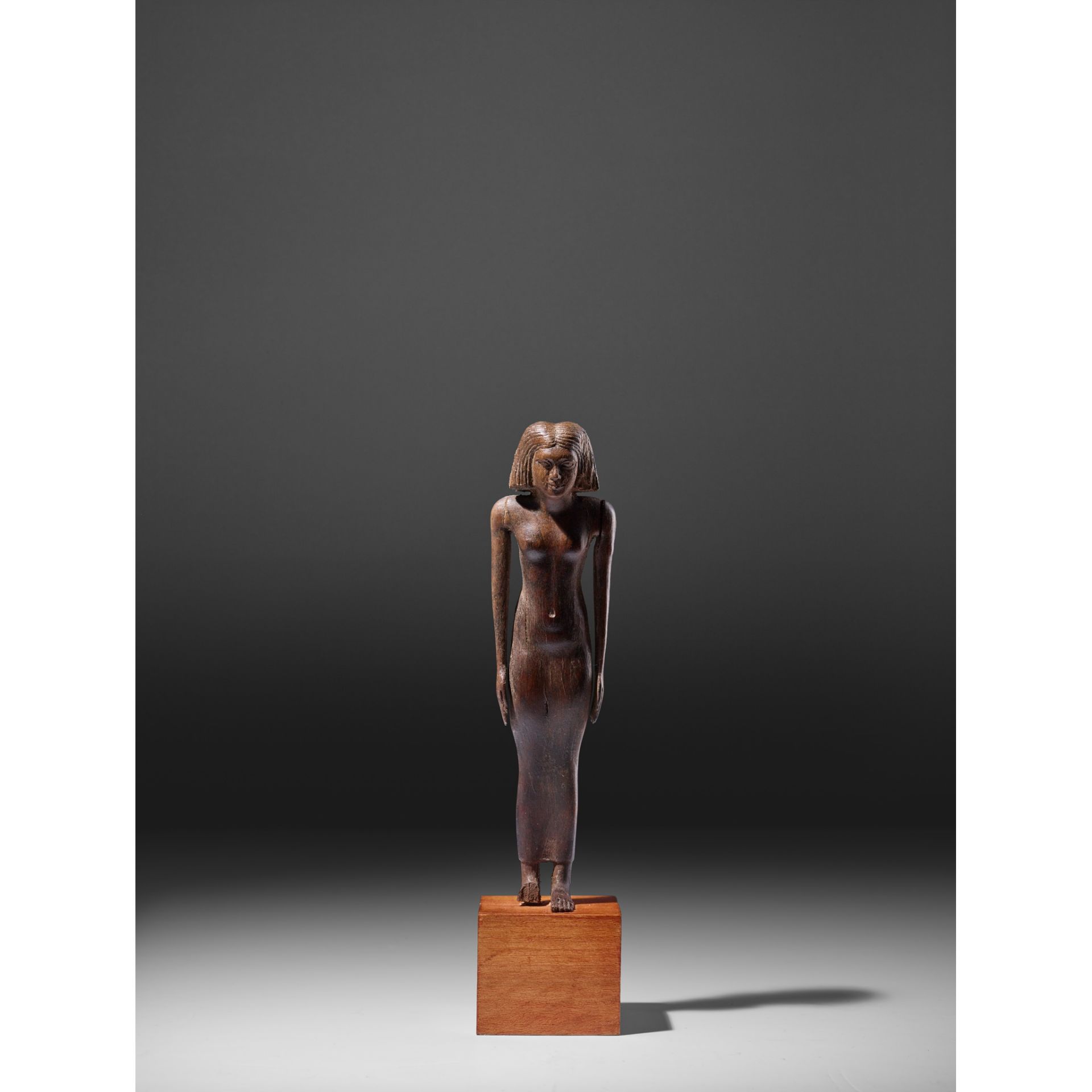 ANCIENT EGYPTIAN WOODEN FIGURE, KA EGYPT, MIDDLE KINGDOM, 12TH DYNASTY, C. 1900 B.C.
