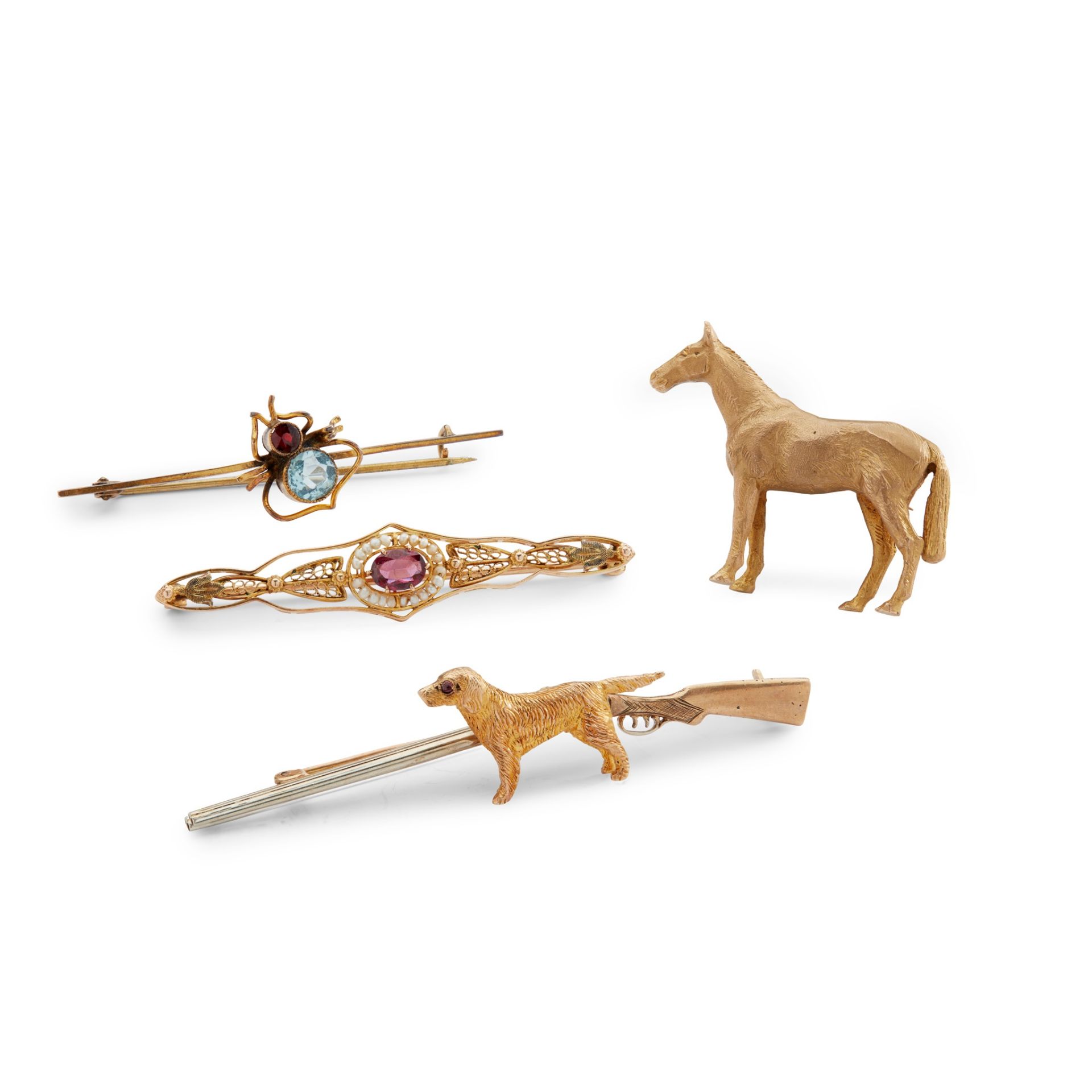 A collection of four early 20th-century brooches