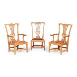 A PAIR OF OAK 'GOSSIP' ARMCHAIRS BY WHEELER OF ARNCROACH EARLY 20TH CENTURY