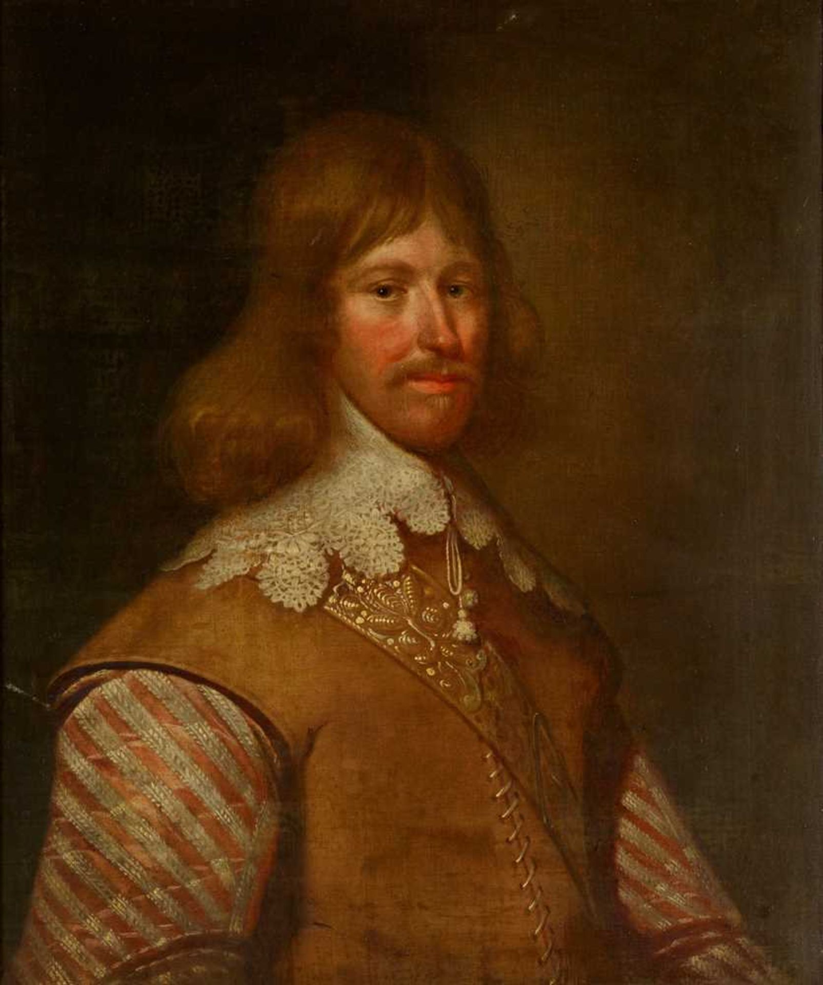 MANNER OF GEORGE JAMESONE HALF LENGTH PORTRAIT OF A MAN IN LEATHER JERKIN AND LACE COLLAR
