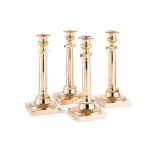 MATCHED SET OF FOUR LACQUERED COPPER CANDLESTICKS EARLY 19TH CENTURY