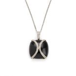 An onyx and diamond pendant