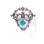 A late 19th century emerald and diamond pendant/brooch