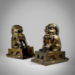 PAIR OF LARGE BRONZE BUDDHIST LIONS LATE QING DYNASTY, 19TH CENTURY