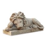 CARVED SANDSTONE FIGURE OF A RECUMBENT LION LATE 19TH/ EARLY 20TH CENTURY