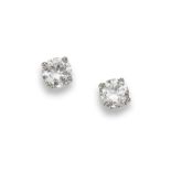 A pair of diamond stud earrings