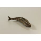 A Continental Silver Articulated Fish. Of typical form. With hinged head. 11cm long. 22grams. 0.7oz.