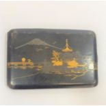 A Japanese gunmetal and gold inlay cigarette case of a village scene by Komei