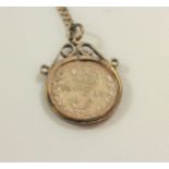 A silver coin-set pendant and chain