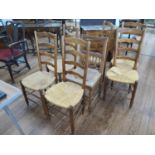 Six chairs with rush seats and one chair with a woven seat (as found) (7)