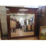 A Sheraton Style Mahogany Over Mantle Mirror. 19th century. With bevelled plate glass. The frame