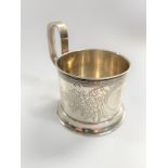 A Russian Silver |Cup Holder. Stamped 84, Moscow 1891. Engraved with flowers and inscribed. 10cm