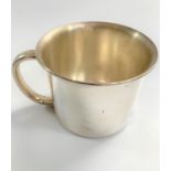 An American Sterling Silver Christening Mug. Stamped Poole Sterling. The interior embossed with a