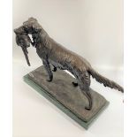 A Bronze Retriever with Pheasant. Possible vintage. Dark brown patination. 31 cm x 36cm