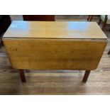 A Victorian Oak Drop leaf table. 73 cm x 100cm x 43cm. Closed