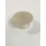 A Small Sterling Silver Circular Box. marks rubbed. Birmingham. Circa 1955. With screw on lid. 3cm