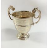 A Small Sterling Silver Two handled Trophy Cup. Inscribed. London 1897. 9.5 cm high. 81 grams