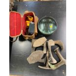 A Quantity of items, cast iron shoe staves, a headlamp and a cine-camera