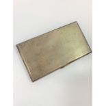 A silver cigarette case 264 grams