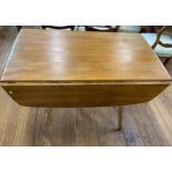 A Modern teak Dropleaf Table. 20th century. 71cm x 112cm x 64cm