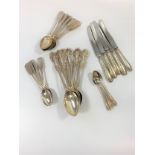 A collection of silver spoons 922 grams