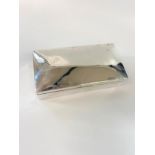 A silver cigarette box